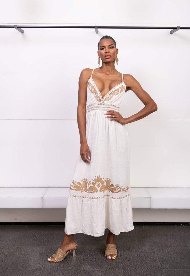 Long beige dress with tobacco-colored embroidery and thin straps