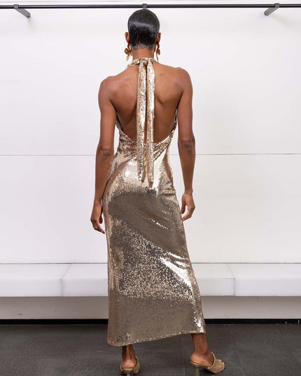 Long gold sequin dress with halter neckline